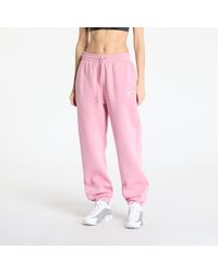 Nike - Pantalons sportswear phoenix fleece high-waisted oversized sweatpants elemental pink/ sail l - Lyst