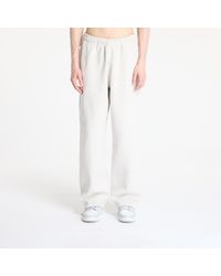 Nike - Jogginghosen Solo Swoosh Open-Hem Fleece Pants Light Bone - Lyst