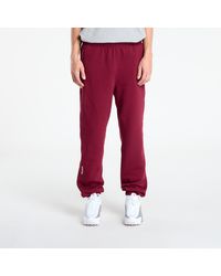 Nike - Pantalons x nocta fleece cs sweatpants dark beetroot/ citron tint l - Lyst