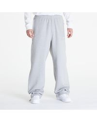 Nike - Pantaloni Solo Swoosh Open-Hem Brushed-Back Fleece Pants Dk Heather - Lyst