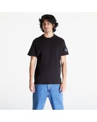 Calvin Klein - T-Shirt Jeans Badge Waffle Short Sleeve Tee - Lyst