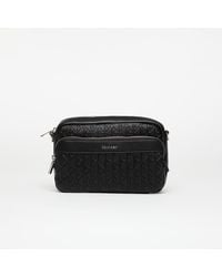 Calvin Klein - Bag Emblem Aop Emboss Crossover - Lyst