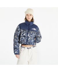 The North Face - Jacke nuptse short jacket dusty periwinkle water distortion small print/ summit navy xs - Lyst