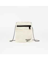 reebok sling backpack
