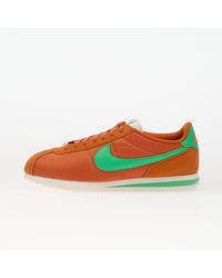 Nike - Baskets cortez textile campfire orange/ green shock-sail eur 40 - Lyst