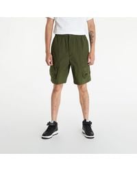 Nike - Shorts nsw te woven unlined utility shorts rough green/ black/ black m - Lyst