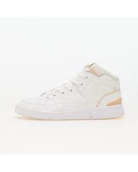 On Shoes - Sneakers W The Roger Clubhouse Mid/ Savannah Eur - Lyst