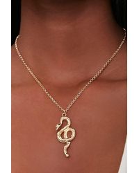 gucci snake ring pendant necklace in gold