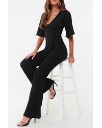 Missguided Textured Flare Jumpsuit At , Black