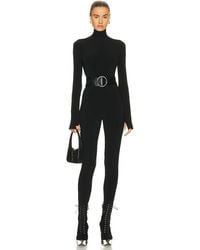 Norma Kamali - Long Sleeve Turtleneck Catsuit With Footie - Lyst