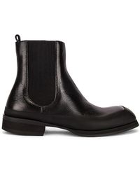 The Row Garden Rubber And Leather Chelsea Boots in Black | Lyst