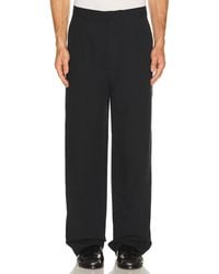 Palmes - Wide Pleated Trousers - Lyst