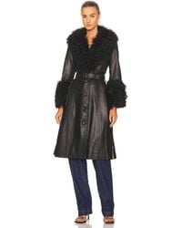 【関税込み】Saks Potts ブラック Bonna シアリングコート Saks Potts Bonnie Fringed Coated Shearling Long Coat in