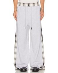 Feng Chen Wang - Patched Panel Jersey Trousers - Lyst
