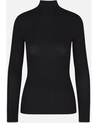 FRAME - Rib Turtleneck - Lyst