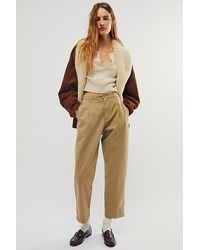Dockers - Original Khaki High Pleated Trousers At Free People In New British Khaki, Size: 26 - Lyst