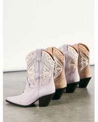 rue slouch western boots