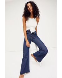 Wrangler - Wanderer High Rise Flare Jeans At Free People In Ski Patrol, Size: 27 - Lyst