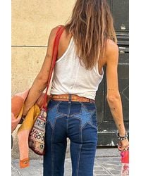 Free People - Firecracker Flare Jeans At Free People In Texas Tux, Size: 24 - Lyst