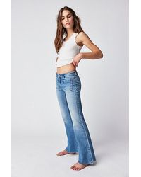 Rolla's - East Coast Low-rise Flare Jeans At Free People In Organic Mid Blue, Size: 29 - Lyst