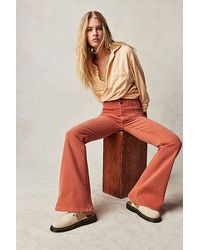 Free People - Jayde Flare Jeans At Free People In Apricot Brandy, Size: 25 - Lyst