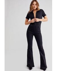 Free People - Jayde Flare Jumpsuit At Free People In Black Mamba, Size: Xs - Lyst