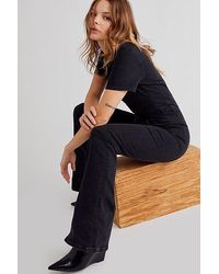 Free People - Jayde Flare Jumpsuit At Free People In Black Mamba, Size: Xs - Lyst