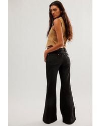 Wrangler - Wanderer High Rise Flare Jeans At Free People In Magic, Size: 28 - Lyst