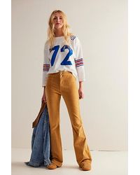 Free People - Jayde Cord Flare Jeans At Free People In Spruce Yellow, Size: 26 - Lyst