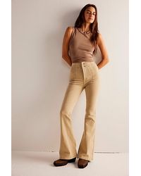 Free People - Jayde Flare Jeans At Free People In Dirty Khaki, Size: 24 - Lyst