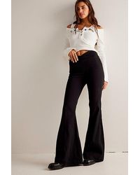 Free People - Venice Beach Flare Jeans At Free People In Black, Size: 24 - Lyst