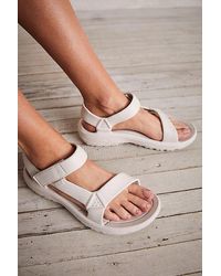Teva - Hurricane Drift Sandals At Free People In Birch, Size: Us 10 - Lyst
