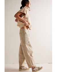 Free People - Stripe Silverton Puddle Barrel Jeans At Free People In Classic Railroad, Size: Xs - Lyst