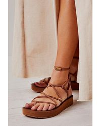 Teva - Midform Infinity Sandals At Free People In Lion, Size: Us 8 - Lyst