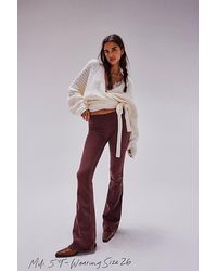 Free People - Penny Pull-on Flare Jeans At Free People In Spicy Red, Size: 24 - Lyst