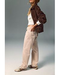 Free People - Leona Low-Rise Twisted Slim Jeans - Lyst