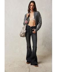 Free People - After Dark Mid-rise Flare Jeans At Free People In Vintage Black, Size: 32 - Lyst
