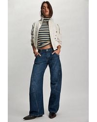 Free People - Highland Low-Rise Twisted Bowed Jeans - Lyst