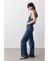 Free People - Corsica Twisted Seam Jumpsuit - Lyst
