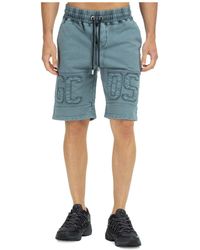 Bermuda sportivi con stampa in nero - uomo - GCDS - divincenzoboutique.com