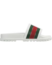 Gucci rubberen stripe heren slippers zwart/beige - Vind je in Sneakerstad