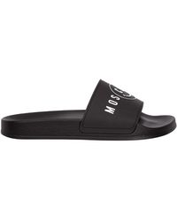 Moschino Sandals, slides and flip flops 