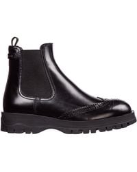 prada tronchetti boots