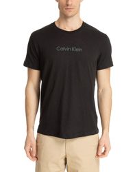 Calvin Klein - T-Shirt Uomo CK ica Corta Girocollo con Stampa Logo Davanti Cotone e Lino Articolo KM0KM00960 - Lyst