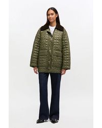 Ganni - Shiny Quilt Midi Jacket - Lyst