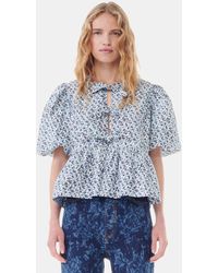 期間限定 セール - 売れ筋ランキングをチェック Ganni Long Sleeve Re-cut Striped Cotton Peplum Blouse in トップス