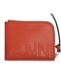 Debossed-logo zip-up wallet Cuir Ganni en coloris Rouge Femme Portefeuilles et porte-cartes Portefeuilles et porte-cartes Ganni 