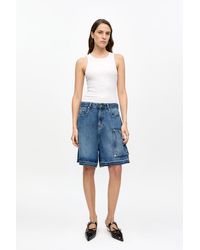Ganni - Short En Denim Bleu Clair En Taille Tencel - Lyst