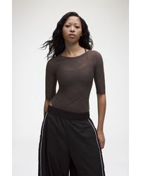 Ganni - X Lululemon Jacquard Mesh Half-Sleeve Bodysuit - Lyst
