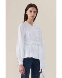 ganni olayan poplin wrap top